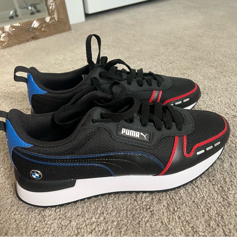 Puma Black Sneakers with Blue and Red Accents